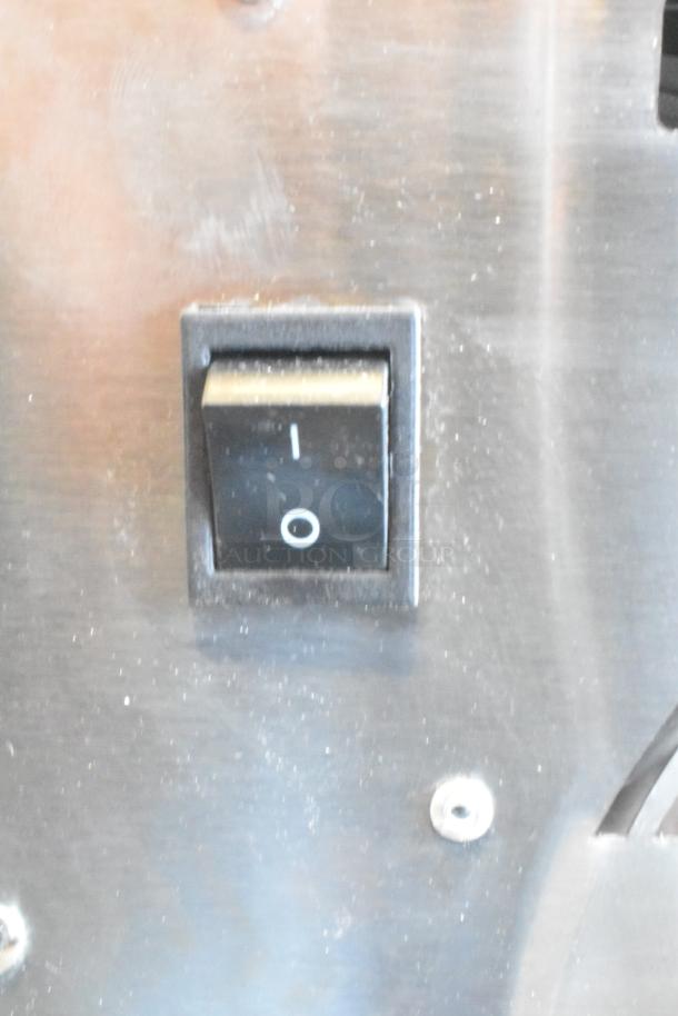 Avantco 177LT06A dehydrator power switch on a scratched stainless steel panel. Works only on highest heat setting.