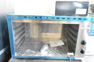 Brand new Avantco 177CHSME32M 32" stainless steel cheese melter, electric countertop, with steel racks, 208/240V.