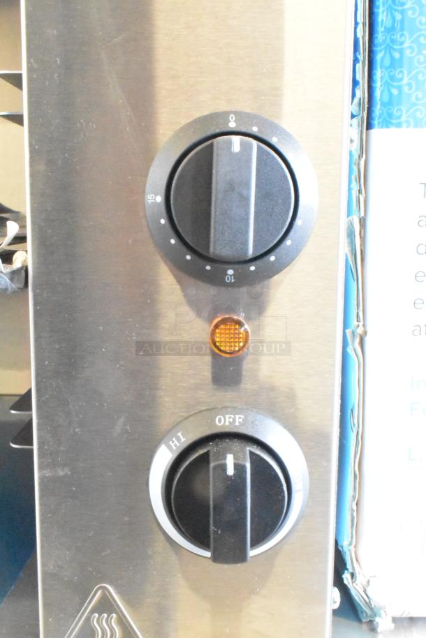 BRAND NEW Avantco 177CHSME32M 32" Cheese Melter, stainless steel, electric, with control knobs, 208/240V, minor scratches.