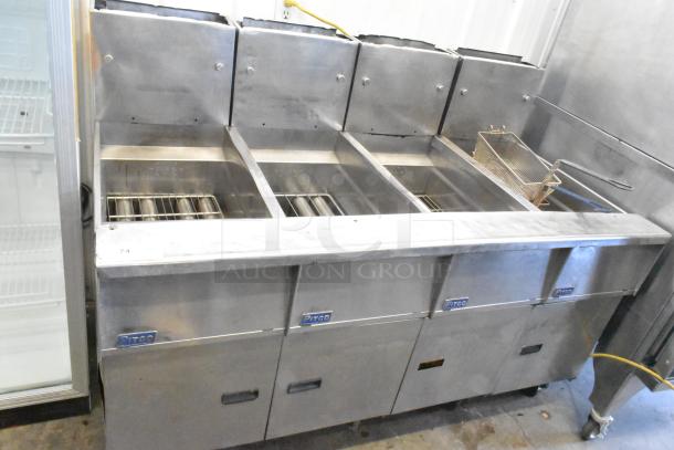 Pitco Frialator stainless steel 4-bay commercial natural gas fryer on casters, 122,000 BTU.