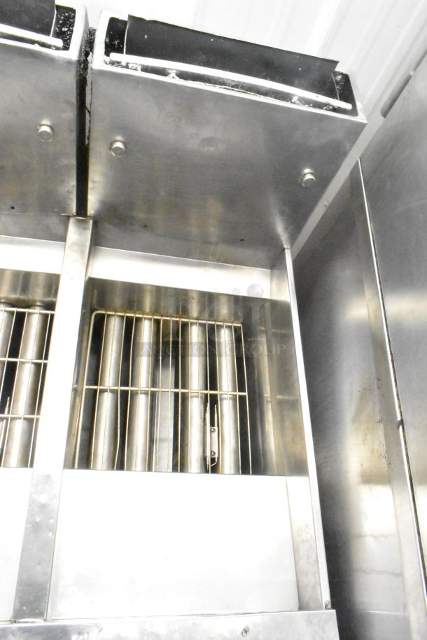 Pitco Frialator stainless steel 4 bay natural gas fryer, 122,000 BTU, on commercial casters, in good condition.