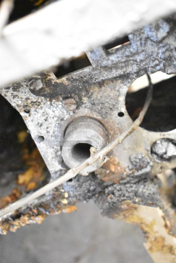 Pitco Frialator commercial deep fryer, 4 bay, stainless steel, natural gas, 122,000 BTU, on commercial casters, weathered.