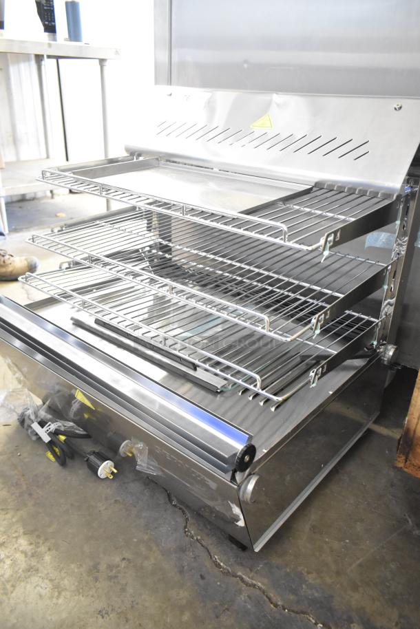 Brand new ServIt 423HDM26SA 26" heated display case, 3 shelves, stainless steel, with broken glass, sliding doors, 120V, 1 phase.