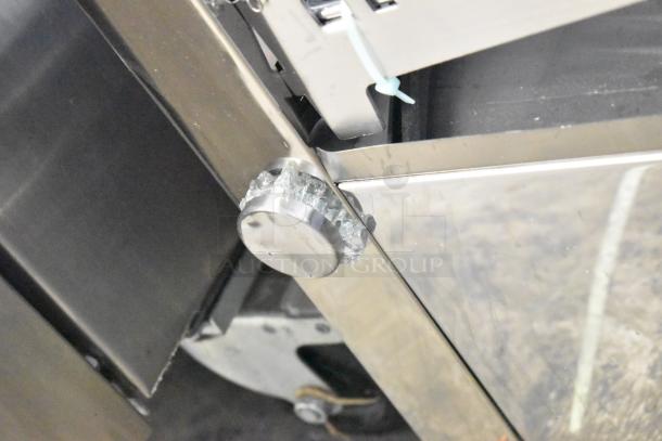 ServIt 423HDM26SA 26" heated display case with broken glass near sliding doors. Brand new, 120V, 1-phase.