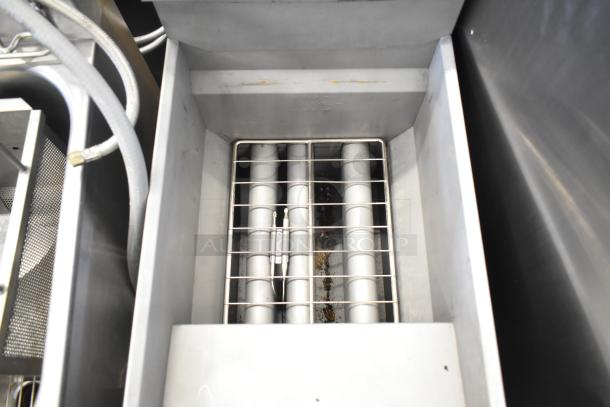 2022 Copper Beech CBF-40 natural gas fryer, 90,000 BTU, with 2 metal fry baskets. Interior view showing heating elements.