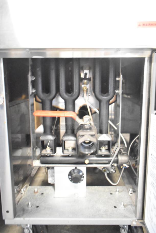 2022 Copper Beech CBF-40 natural gas deep fat fryer with 2 metal fry baskets, 90,000 BTU, commercial floor style, open panel view.