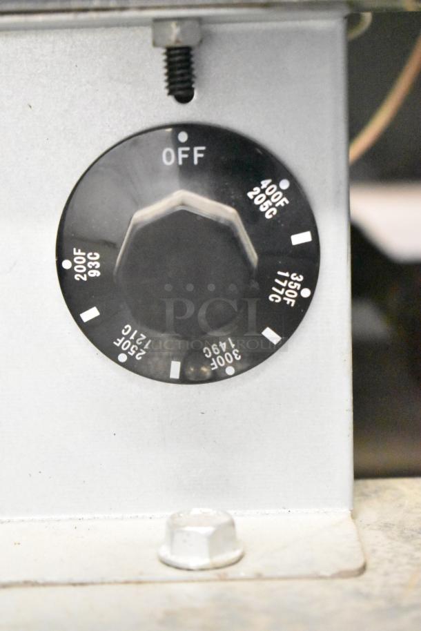 Temperature control dial of the 2022 Copper Beech CBF-40 natural gas fryer, showing temperature settings from 200°F to 400°F.