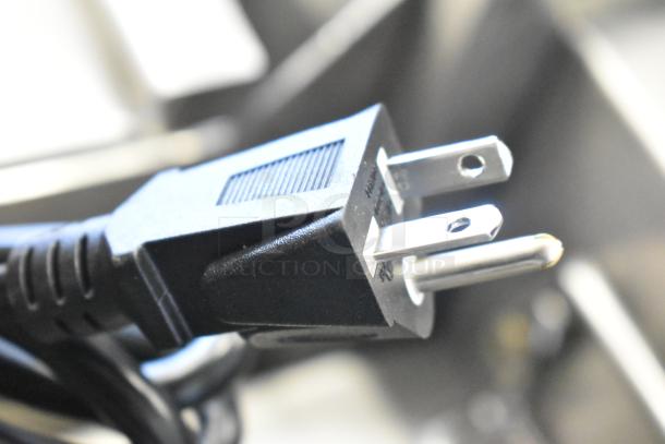 Close-up image of a power plug for the Avantco 177CER200 countertop electric range, 208/240 volts, 1 phase.