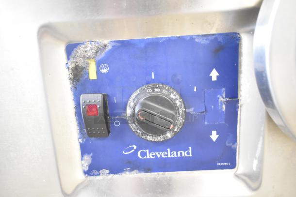 Cleveland BPAN-1001 braising pan control panel with dial and switch. Panel is worn with visible dirt and discoloration.