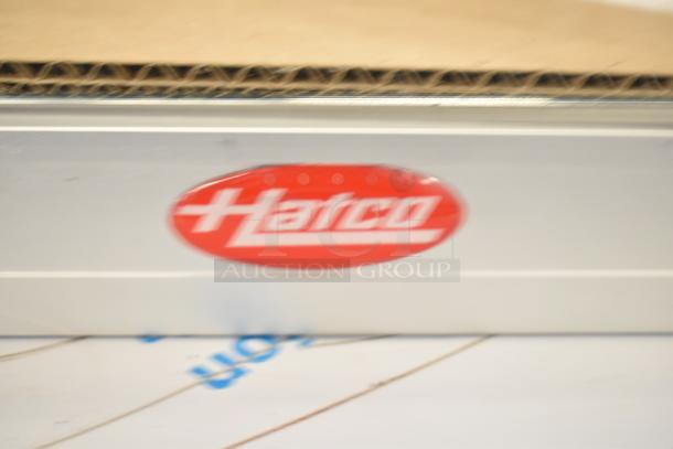 Hatco FSDT-2 display cabinet, two doors, four-tier circle rack, motor, 120 volts, 1 phase. Hatco logo visible.