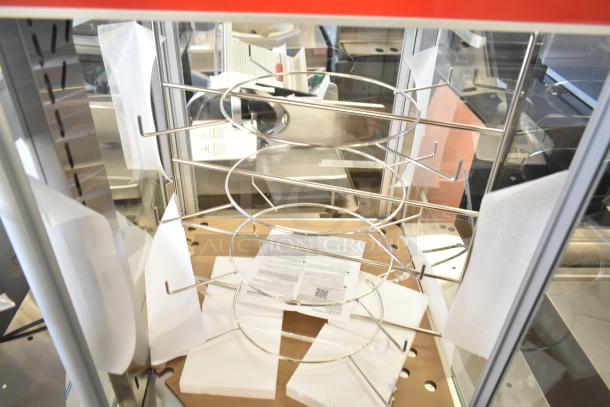 Hatco FSDT-2 Flav-R-Savor display cabinet with four-tier circle rack, clear glass doors, and motor. 120V, excellent condition.