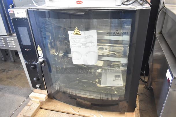 Brand new 2022 Alto Shaam AR-7T electric rotisserie oven, 380-415V, 1 phase, 7 spits, visible labels and manual included.