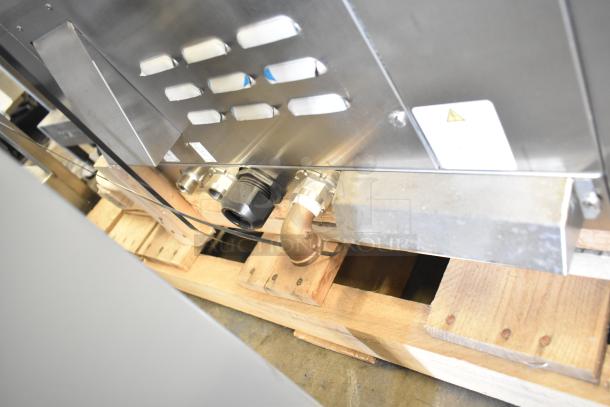 Brand new 2022 Alto Shaam AR-7T commercial rotisserie oven on pallet, showcasing vent and cable connections.