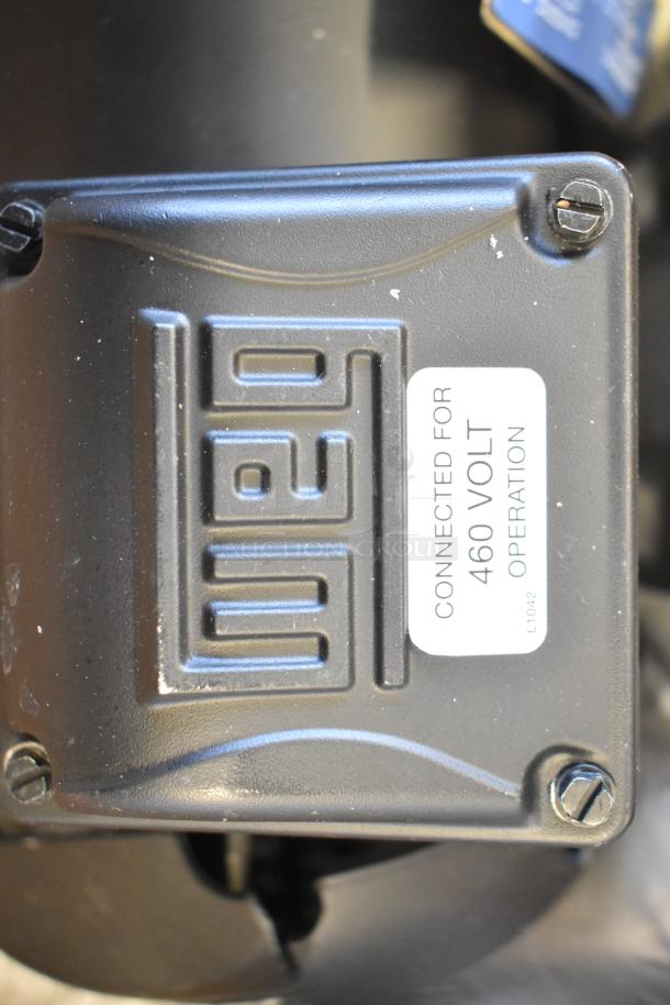 BRAND NEW Weg 13528748 Motor, 230/460V, 3 Phase, scratch and dent condition, labeled for 460V operation.
