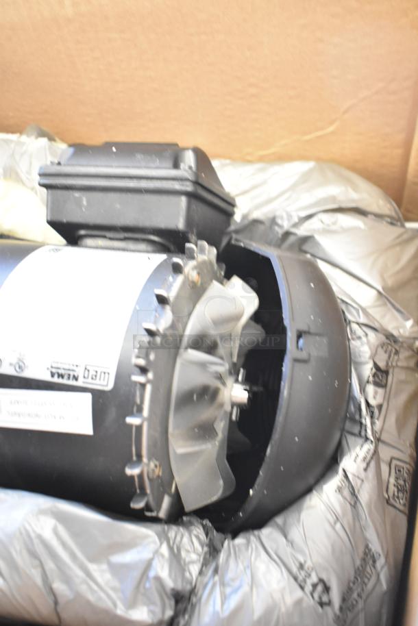 Brand new Weg 13528748 motor, 230/460 volts, 3 phase, in packaging, scratch and dent condition, NEMA label visible.
