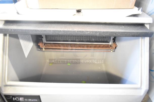 Ice-O-Matic ICEU220HA1 undercounter ice machine, 115V, internal view showing condenser, moderate use signs.