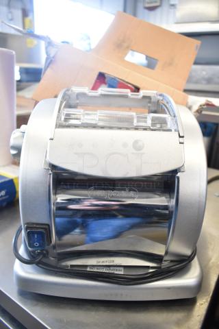 Brand new Imperia NSP countertop pasta machine, 120V, 1 Phase. Scratch and dent condition, visible power switch and label.