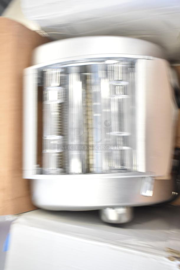 Brand new Imperia NSP Countertop Pasta Machine, 120V, 1 Phase. Visible scratches and dents, stainless steel finish.
