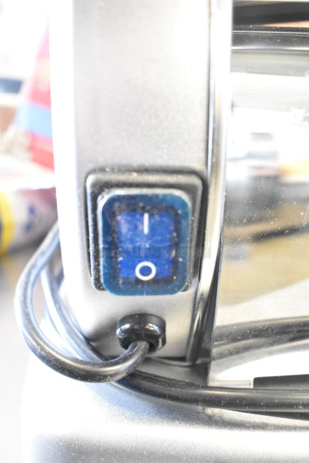 BRAND NEW Imperia NSP countertop pasta machine, 120V, 1 Phase, showing power switch. Scratch and dent condition.