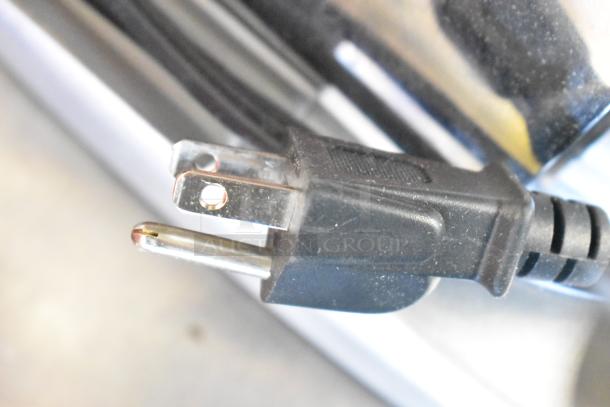 Brand new Imperia NSP countertop pasta machine plug, showing standard 120-volt, 1-phase electrical cord.