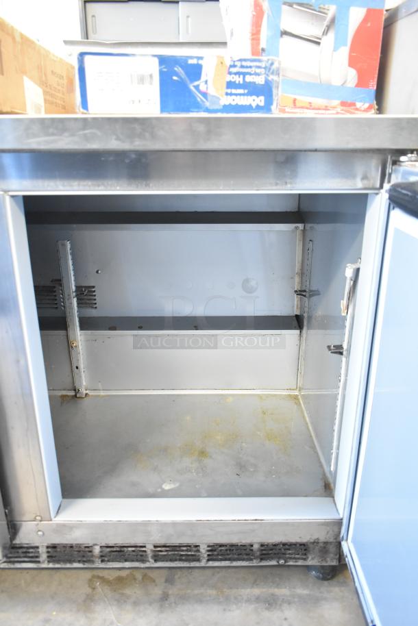 Beverage Air WTR72AY Commercial Undercounter Cooler, 3-door, 115V, visible interior wear, includes shelving brackets.