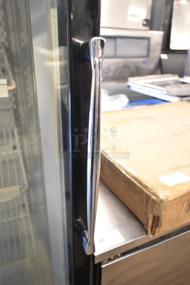 Pulse ULG30BSSF-5 single door reach-in cooler merchandiser, features sleek handle, excellent condition, 115 volts, 1 phase.