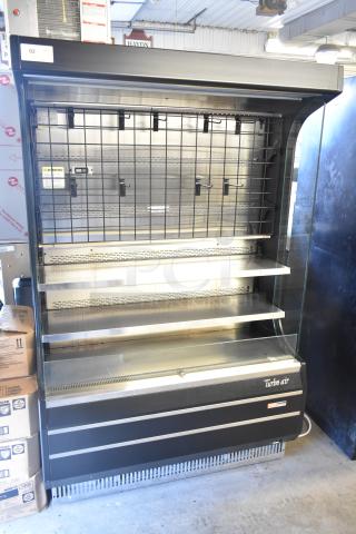 Turbo Air TOM-50B 51" black refrigerated air curtain merchandiser, 120V, 1 Phase, with glass front and metal shelves.