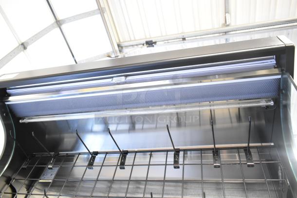 Turbo Air TOM-50B 51" black refrigerated air curtain merchandiser, features metal shelving, suitable for 120 volts, 1 phase.