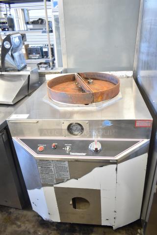 Toastmaster TCT-1627 R commercial tandoor oven, 85,500 BTU, natural gas, ceramic, worn condition, visible safety labels.