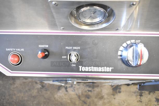 Toastmaster TCT-1627 R Commercial Ceramic Natural Gas Tandoori Oven control panel with igniter, pilot valve, safety valve.