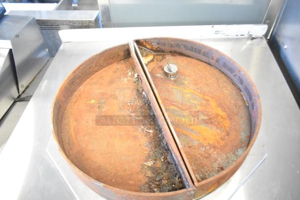 Toastmaster TCT-1627 R commercial tandoor oven, ceramic, natural gas powered, 85,500 BTU, showing signs of use.