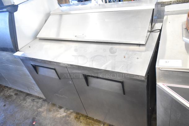 True TSSU-48-12 commercial sandwich prep table with bain marie mega top, on casters, stainless steel, 115 volts, 1 phase.
