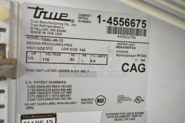 True TSSU-48-12 Commercial Sandwich Salad Prep Table, Mega Top, on casters. Label shows 115V, 1-phase, serial 1-4556675.