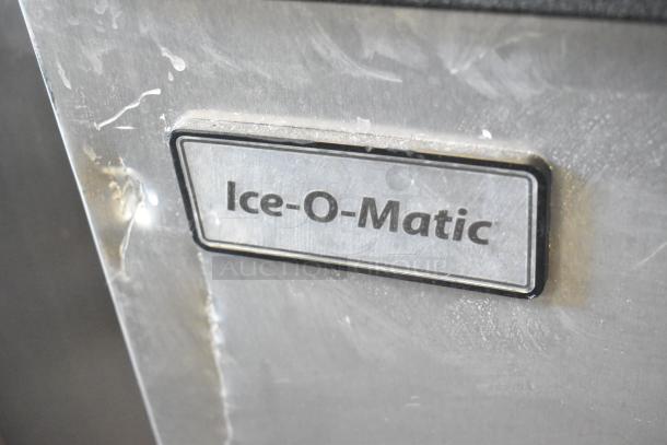 2023 Ice-O-Matic CIM1446HR6 ice machine on B110PSB bin, stainless steel, 208-230V, 1 phase, brand logo visible.