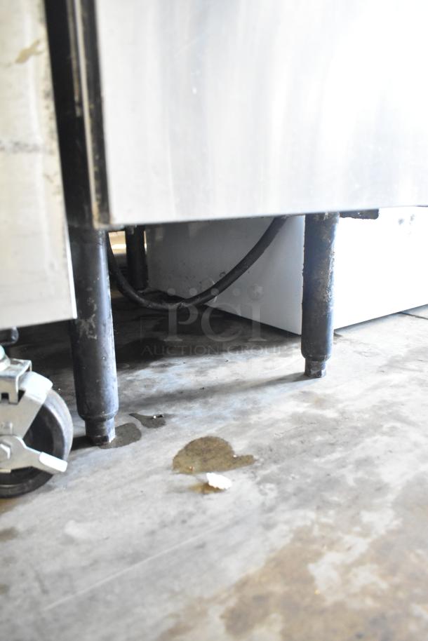 2018 Pitco Frialator SE14 commercial electric deep fat fryer, 208 volts, 3 phase, showing underside with wheels.