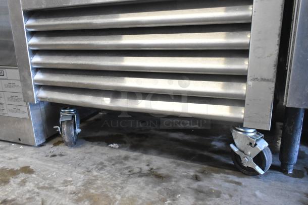 2018 True T-23F-HC Commercial Freezer, single door, sturdy commercial casters, 115V, visible minor wear.
