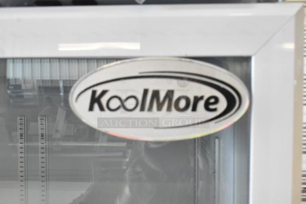KoolMore KM-MDR-2GD-35 commercial cooler, brand new, scratch and dent condition, 2 glass doors, KoolMore logo visible.