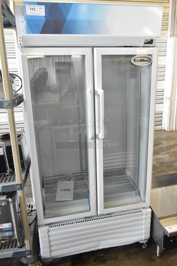Brand new KoolMore KM-MDR-2GD-35 commercial cooler, scratch and dent condition, 2 glass doors, on casters, 115V.