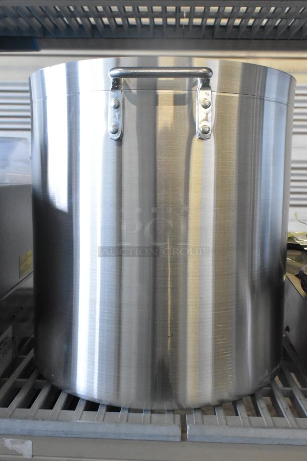 BRAND NEW SCRATCH AND DENT! 471SP40QT Choice 40 Qt. Aluminum Stock Pot, standard weight, minor dents visible.