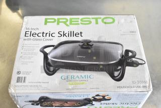 Presto 16" Ceramic Electric Skillet with Glass Cover, silver, brand new, model 06860, 120V, nonstick, visible package wear.
