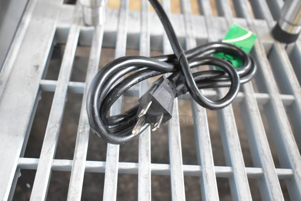 Crathco CS-1D/2E-16-290 refrigerated drink dispenser base, no hoppers. Brand new, 120V, scratch and dent condition.