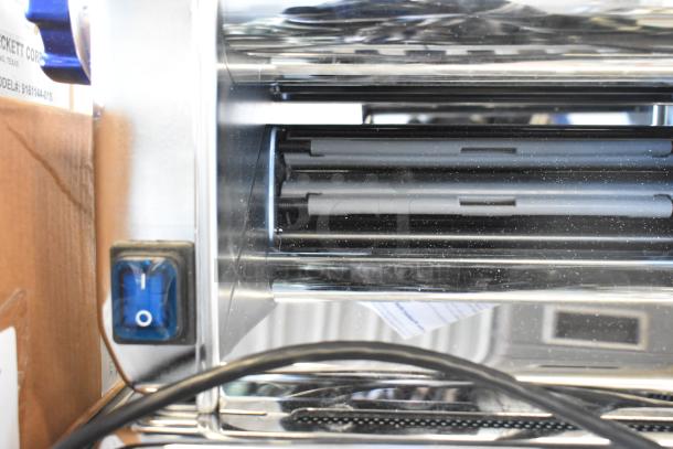 Imperia 915PM038 electric pasta machine, stainless steel, 8 1/4", slight scratches, 120 volts, 1 phase, brand new condition.