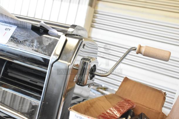BRAND NEW SCRATCH AND DENT! Imperia 915PM038 electric stainless steel pasta machine, 8 1/4", 120V, handle visible.