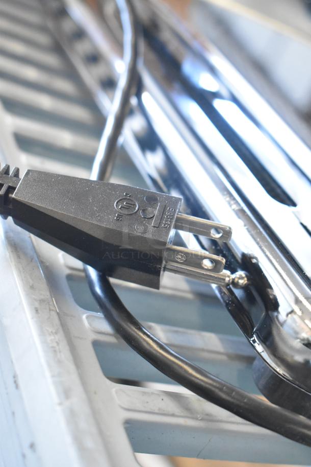 Brand new Imperia 915PM038 stainless steel electric pasta machine. 8.25", 120V, 1 phase, with minor scratches and dents.