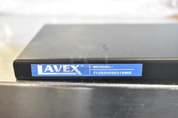 Lavex 5"x18" matte black stainless steel wall-mount shelf, model 712SSWS0518MB, scratch and dent, new.