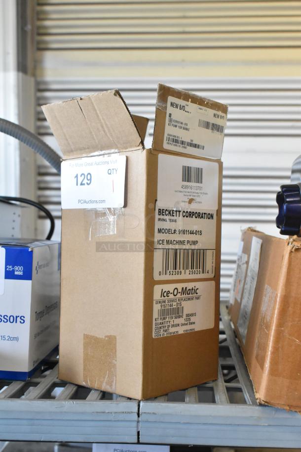 Brand new Ice-O-Matic 9161144-01S Kit Pump, 115V 50/60Hz. Box has scratches, visible labels show model and specs.