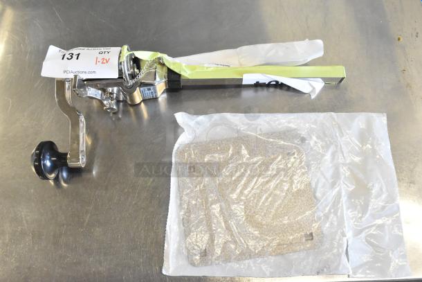 Brand new Hamilton Beach HCO500 manual side cut can opener, heavy-duty #10, with minor scratches and dents, auction tag visible.