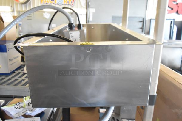 Brand new Alto-Shaam 100-HWD643 drop-in hot food well, 4/3 size, scratch and dent, for 6" deep pans, 120V, 1 phase.