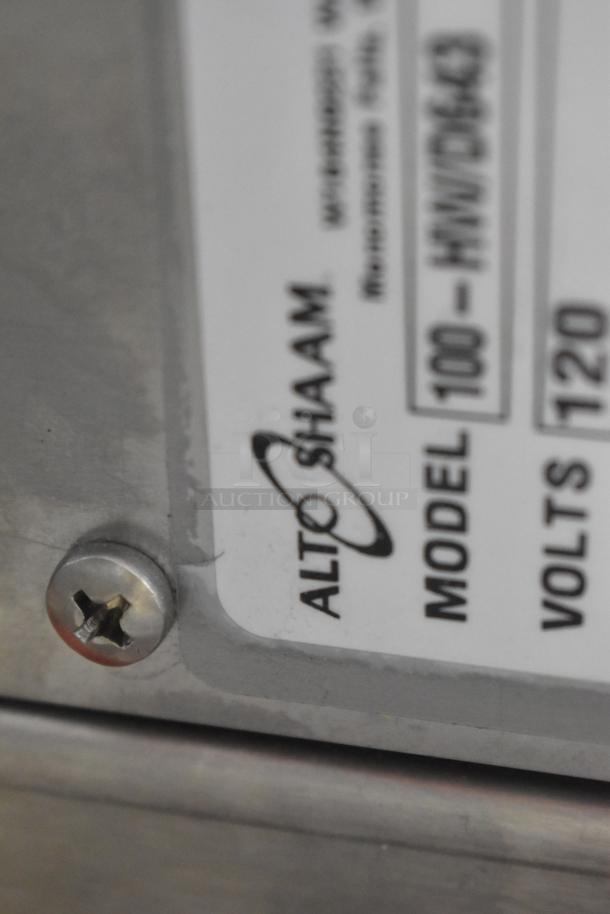 Alto-Shaam 100-HWD643 hot food well, 120 volts, model label close-up. Scratches visible, brand new with dents.