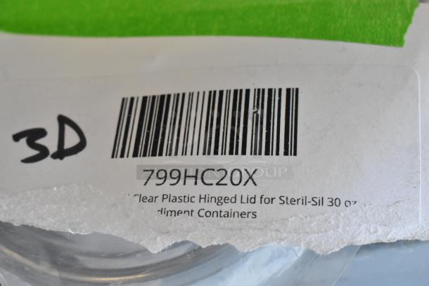 Barcode label for Steril-Sil HC-20-X Clear Plastic Hinged Lid, model 799HC20X, for 30 oz. condiment containers.